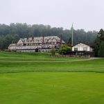 Panoramic view of a lush green golf course at Baltusrol Golf Club. Smooth