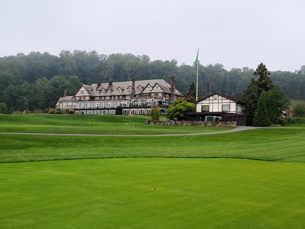 Panoramic view of a lush green golf course at Baltusrol Golf Club. Smooth