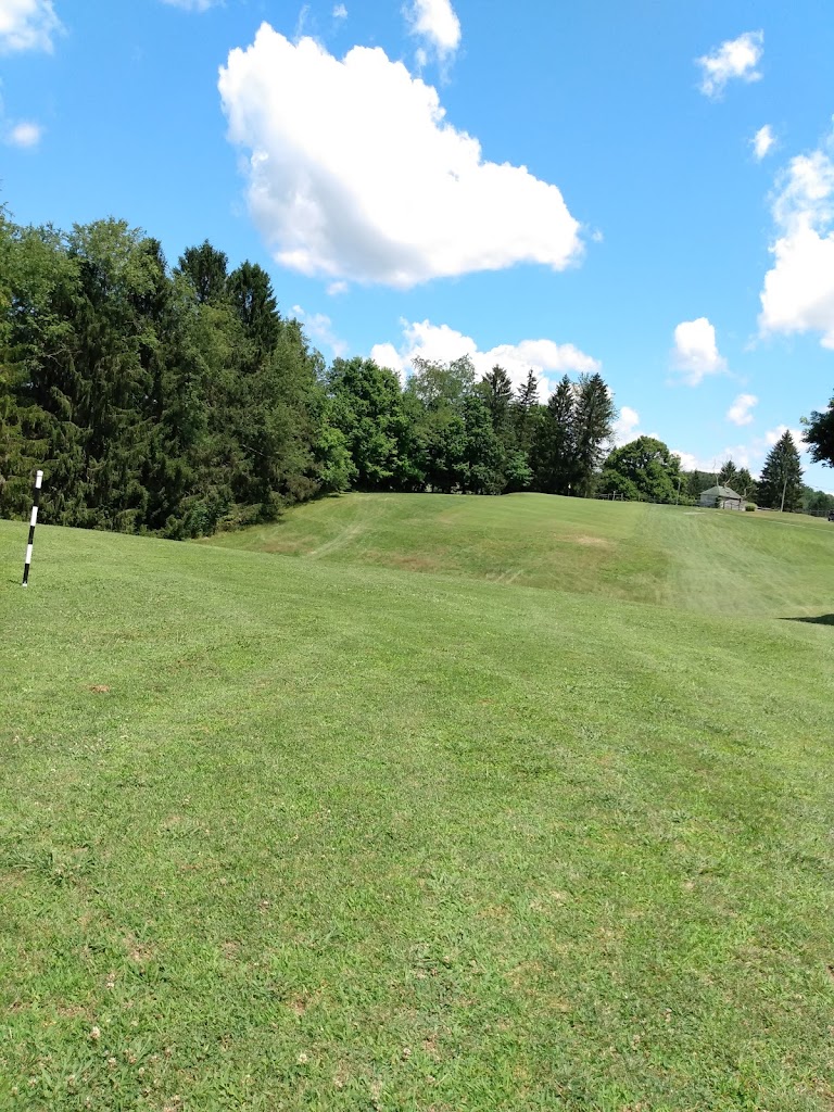 Panoramic view of a lush green golf course at Barbour Country Club Golf Course. Smooth