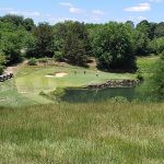 Panoramic view of a lush green golf course at Bardstown Country Club at Maywood. Smooth