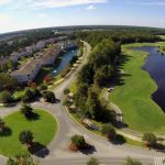 Panoramic view of a lush green golf course at Barefoot Resort & Golf. Smooth