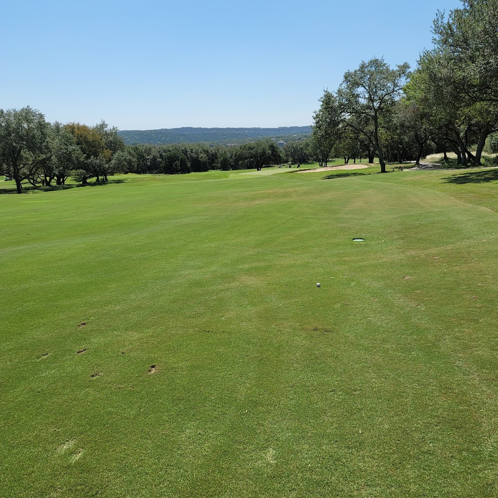 Panoramic view of a lush green golf course at Barton Creek Coore Crenshaw Golf Course. Smooth