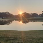 Panoramic view of a lush green golf course at Baton Rouge Country Club. Smooth