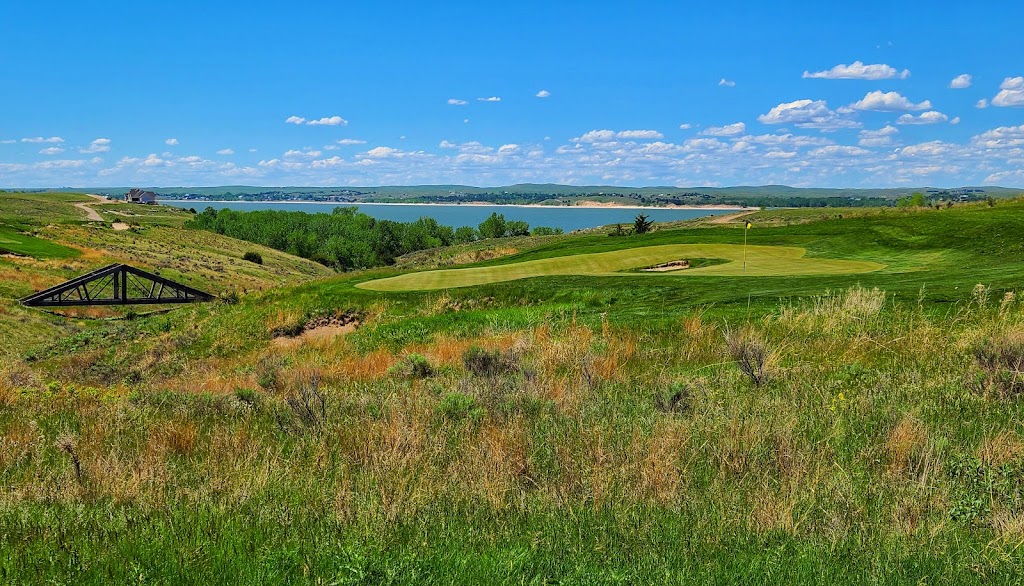 Panoramic view of a lush green golf course at Bayside Golf. Smooth