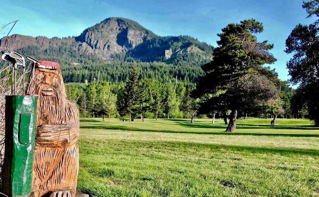 Panoramic view of a lush green golf course at Beacon Rock Golf Course. Smooth