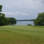 Panoramic view of a lush green golf course at Bear Trace at Harrison Bay (TN Golf Trail). Smooth