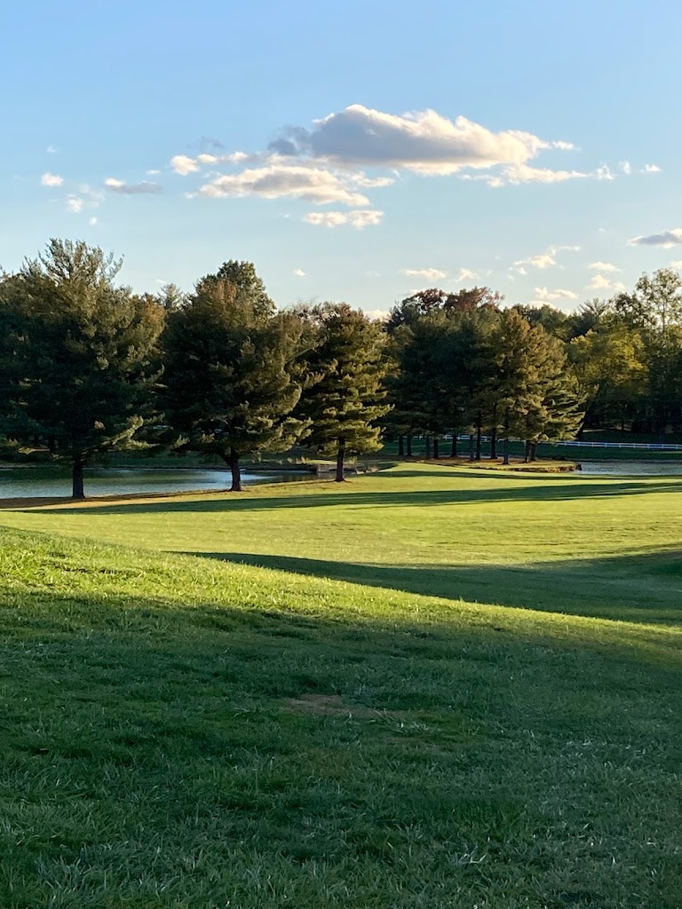 Panoramic view of a lush green golf course at Beaver Creek Country Club. Smooth