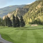 Panoramic view of a lush green golf course at Beaver Creek Golf Club. Smooth