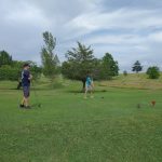Panoramic view of a lush green golf course at Beaver Valley Golf. Smooth