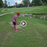 green grass with the flag in the hole.