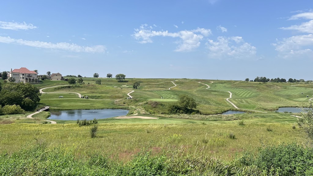 Panoramic view of a lush green golf course at Bent Tree Golf Club. Smooth