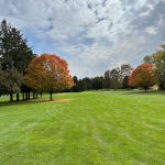 Panoramic view of a lush green golf course at Berkleigh Golf Club. Smooth