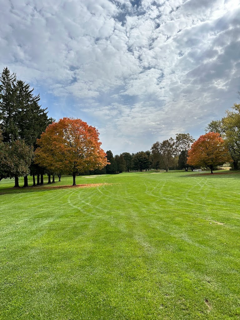 Panoramic view of a lush green golf course at Berkleigh Golf Club. Smooth