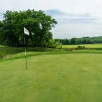 Panoramic view of a lush green golf course at Berkshire Golf Club. Smooth
