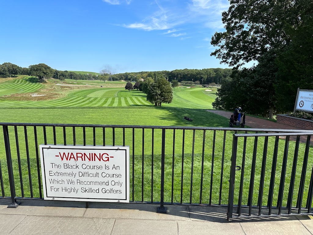 Panoramic view of a lush green golf course at Bethpage Black Golf Course. Smooth