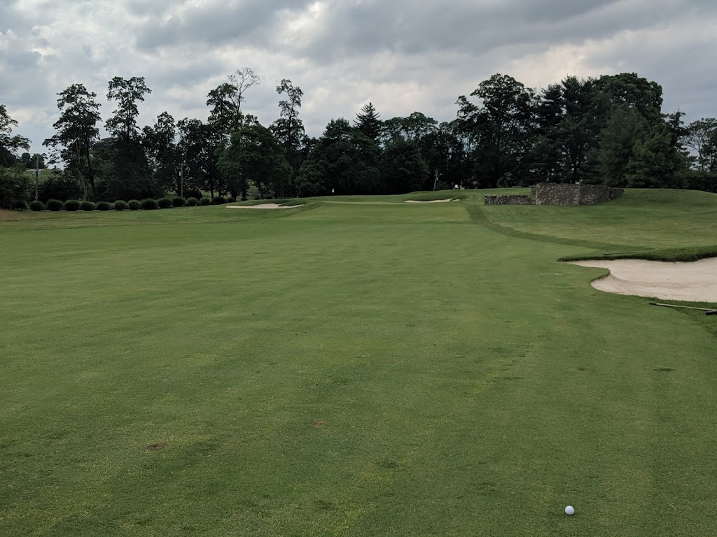 Panoramic view of a lush green golf course at Bidermann Golf Course. Smooth