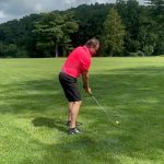 Panoramic view of a lush green golf course at Big Bend Golf Course. Smooth