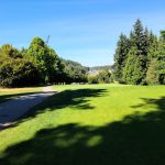 Panoramic view of a lush green golf course at Bill Wright Golf Complex at Jefferson Park. Smooth