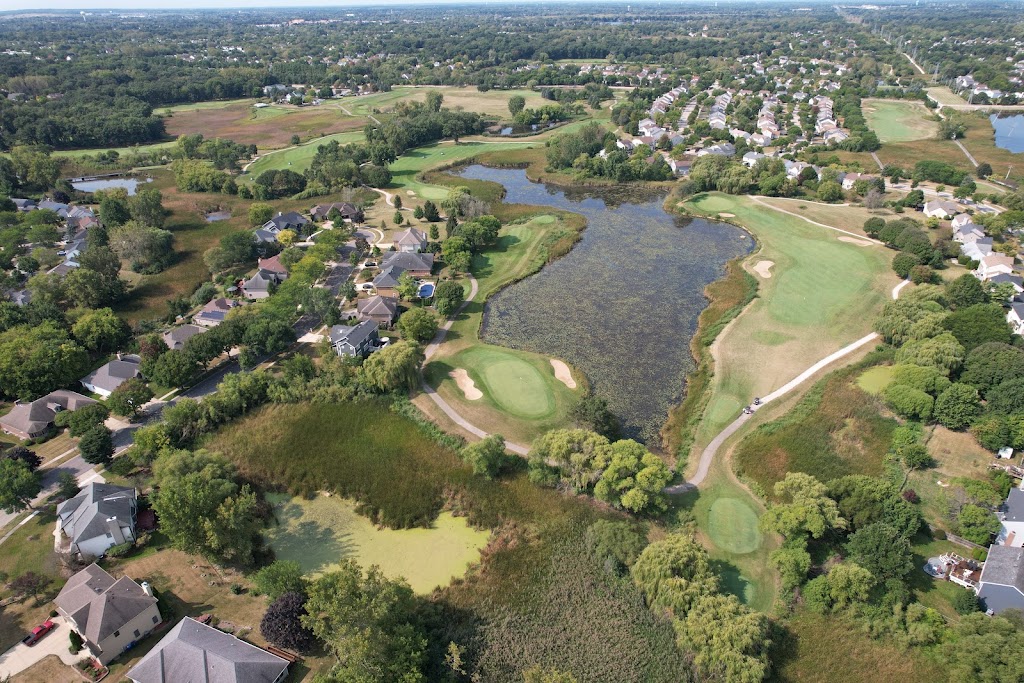 Panoramic view of a lush green golf course at Bittersweet Golf Club. Smooth