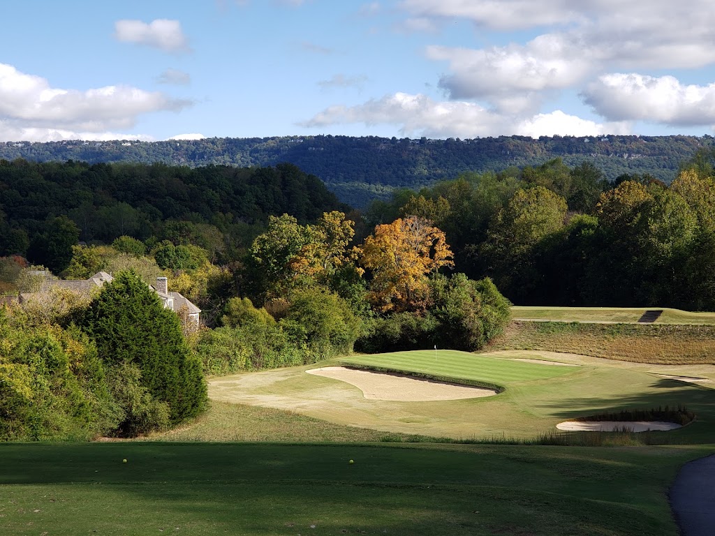 Panoramic view of a lush green golf course at Black Creek Club. Smooth