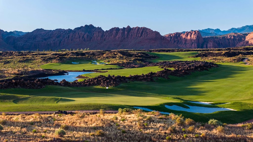 Panoramic view of a lush green golf course at Black Desert Golf Course. Smooth