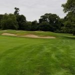 Panoramic view of a lush green golf course at Black Hall Club. Smooth