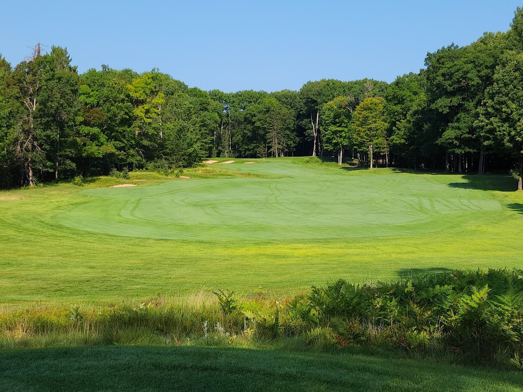 Panoramic view of a lush green golf course at Black Lake Golf Club. Smooth