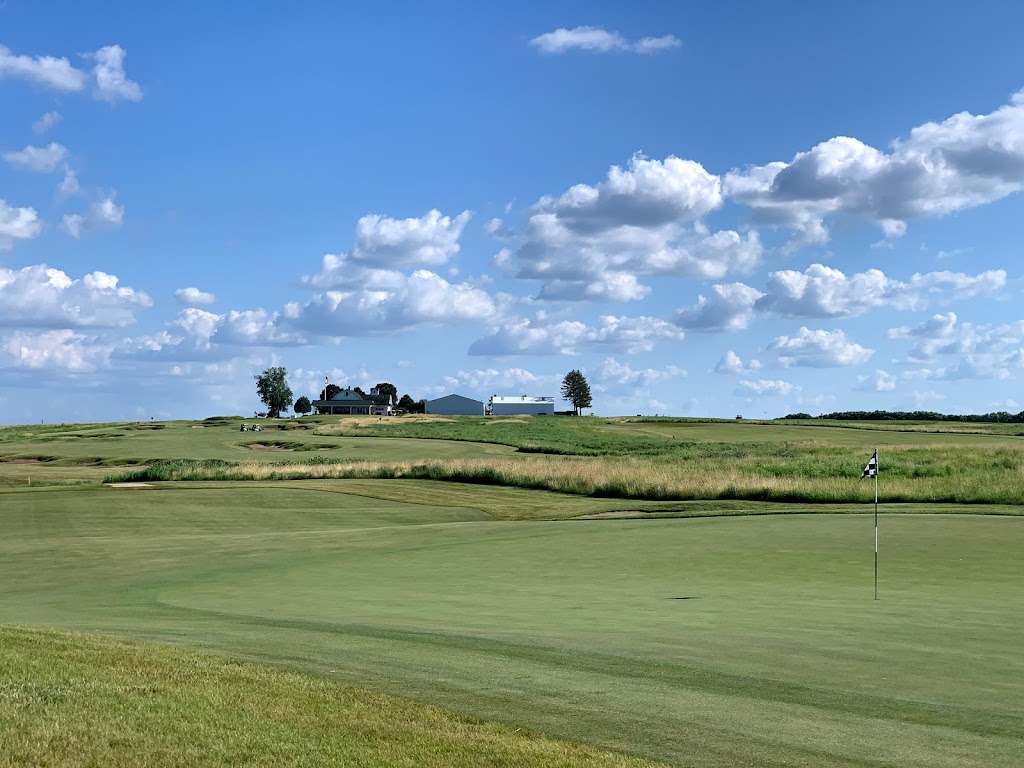 Panoramic view of a lush green golf course at Black Sheep Golf Club. Smooth
