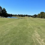 Panoramic view of a lush green golf course at Blackberry Trail Golf Course. Smooth