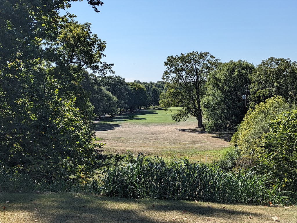 Panoramic view of a lush green golf course at Blacklick Woods Golf Course. Smooth