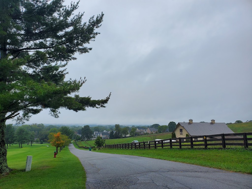Panoramic view of a lush green golf course at Blacksburg Municipal Golf Course. Smooth