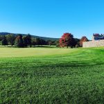Panoramic view of a lush green golf course at Blackwood Golf Course. Smooth