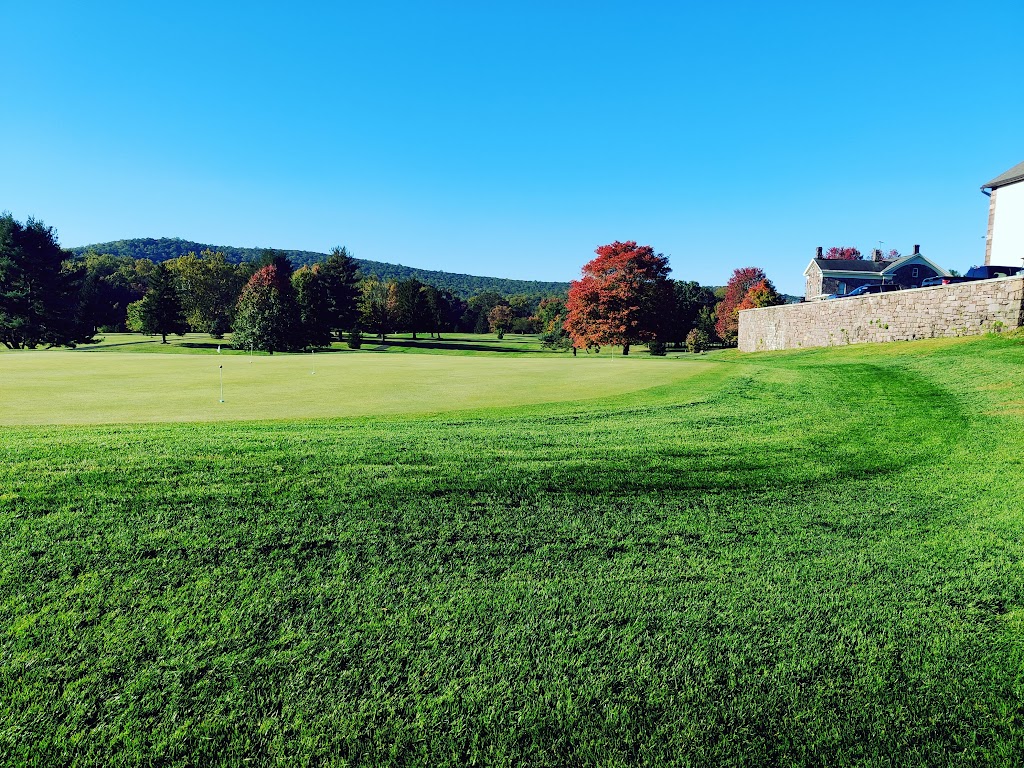 Panoramic view of a lush green golf course at Blackwood Golf Course. Smooth