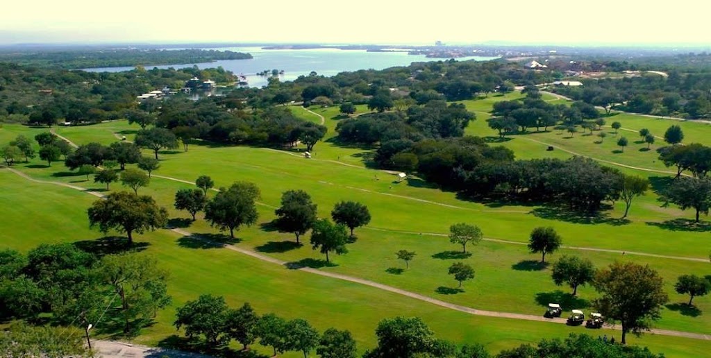 Panoramic view of a lush green golf course at Blue Lake Golf Club. Smooth