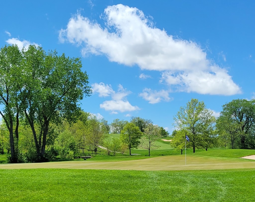 Panoramic view of a lush green golf course at Blue Top Ridge Golf Course. Smooth