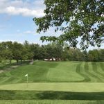 Panoramic view of a lush green golf course at Boone Links Golf & Event Center. Smooth