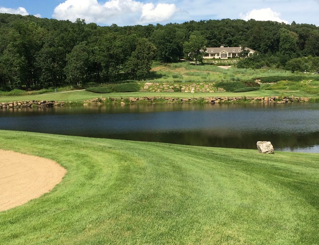 Panoramic view of a lush green golf course at Boone Valley Golf Club. Smooth
