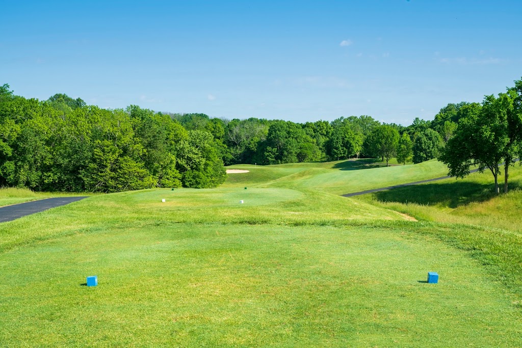 Panoramic view of a lush green golf course at Boone's Trace National Golf Club. Smooth