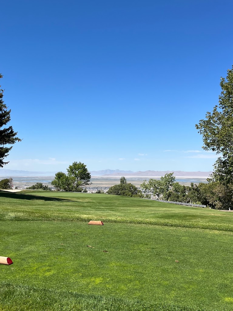 Panoramic view of a lush green golf course at Bountiful Ridge Golf Course. Smooth