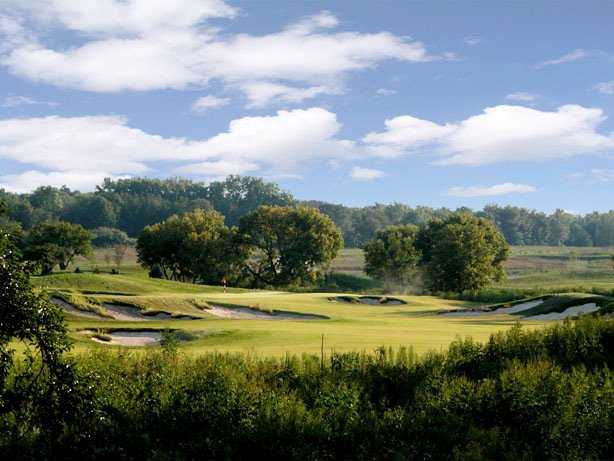 Panoramic view of a lush green golf course at Bowes Creek Country Club. Smooth