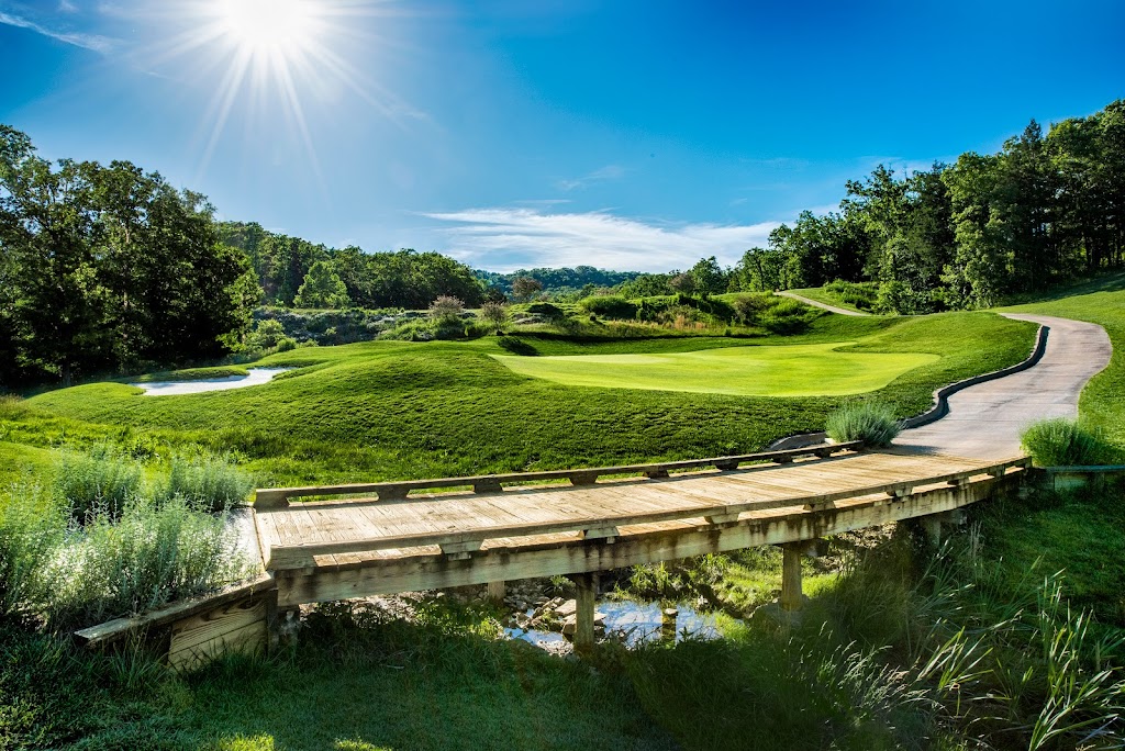 Panoramic view of a lush green golf course at Branson Hills Golf Club. Smooth