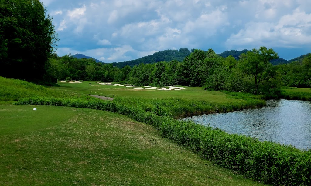 Panoramic view of a lush green golf course at Brasstown Valley Golf Club. Smooth