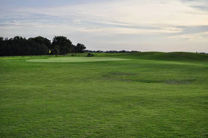 Panoramic view of a lush green golf course at Brazell's Creek Golf Course at Jack Hill State Park. Smooth