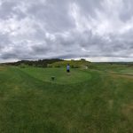Panoramic view of a lush green golf course at Briarwood Country Club. Smooth
