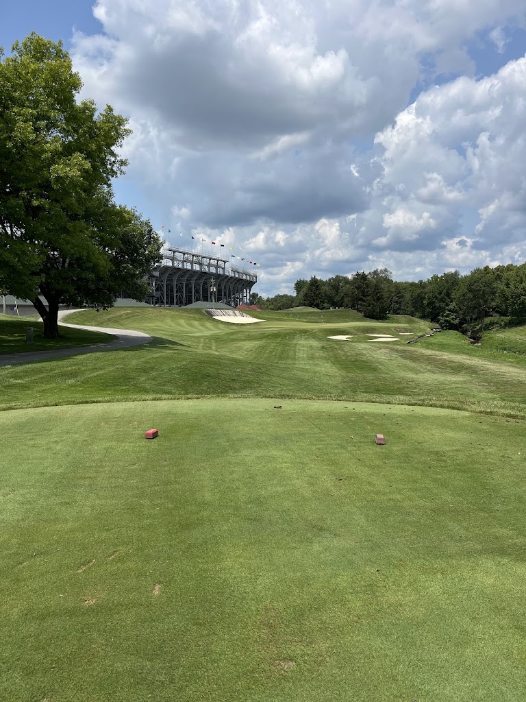 Panoramic view of a lush green golf course at Brickyard Crossing. Smooth