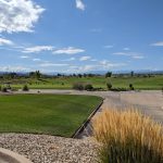Panoramic view of a lush green golf course at Bridges Golf & Country Club. Smooth