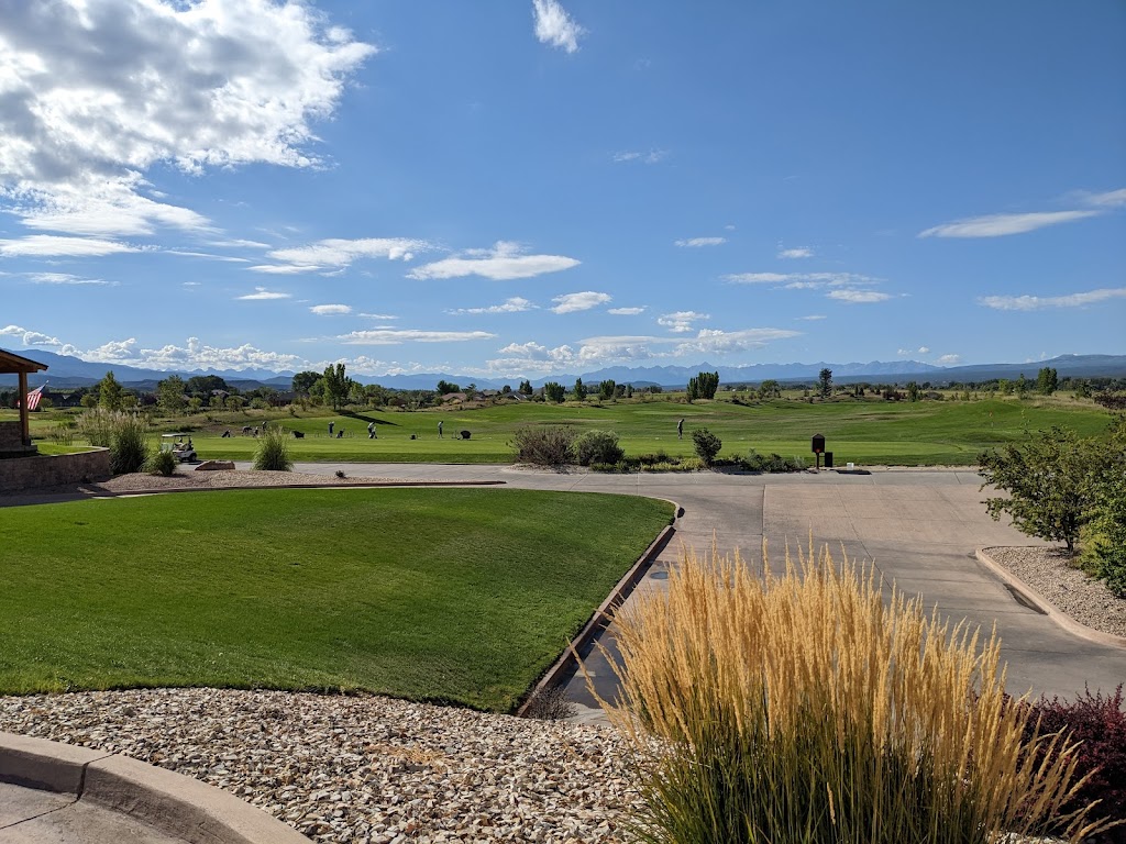 Panoramic view of a lush green golf course at Bridges Golf & Country Club. Smooth