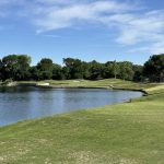 Panoramic view of a lush green golf course at Bridlewood Golf Club. Smooth