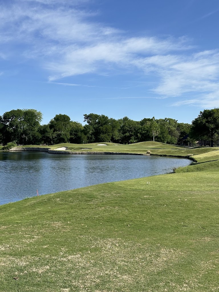 Panoramic view of a lush green golf course at Bridlewood Golf Club. Smooth
