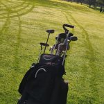 green grass with the flag in the hole.